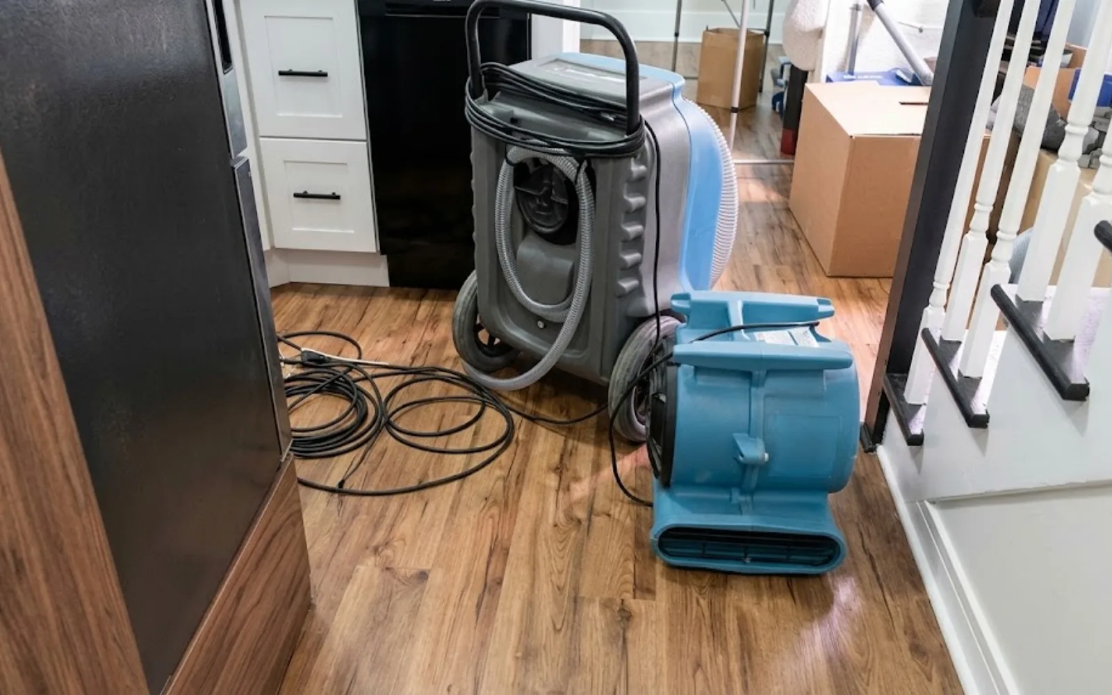 Industrial drying and dehumidifier equipment set up in a residential room
